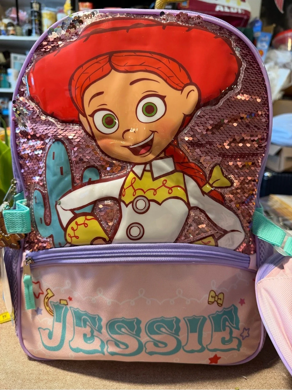 Disney Jessie Sequin Kids Backpack in Pink, Purple & Red